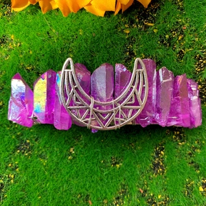 Detail of bohemian spring clip with purple aura quartz crystals and silver crescent moon