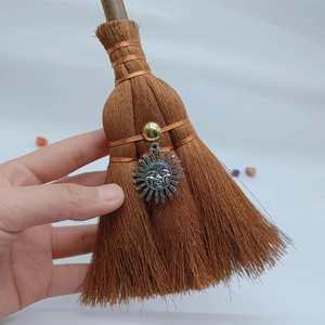 Miniature handmade wicca broom charm with silver sun pendant and fiber bristles