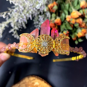 Bohemian gold goddess crown with raw pink crystal columns and sun moon metal elements