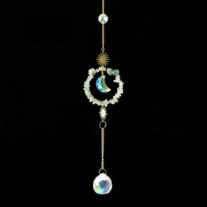Handmade suncatcher featuring natural green crystal ring and faceted crystal ball
