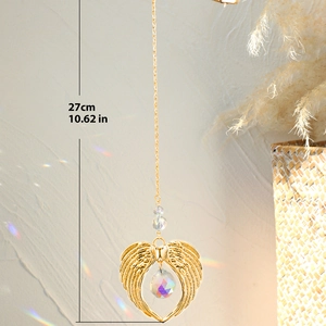 Detail of 27cm angel wing suncatcher with crystal ball and rainbow light reflection