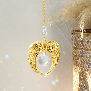 Golden angel wing suncatcher with faceted crystal ball for window or garden decoration