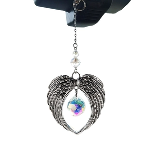 Crystal suncatcher hanging decoration with silver angel wings and colorful glass prism