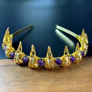 Handmade Gothic Halloween crow skull headband featuring purple amethyst beads on a wooden base