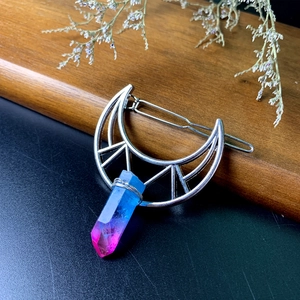 Silver crescent moon hair clip with blue and pink gradient crystal point pendant