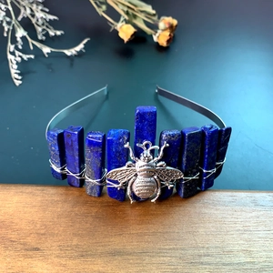 Handmade silver headband featuring blue crystal raw stones and a large bee detail