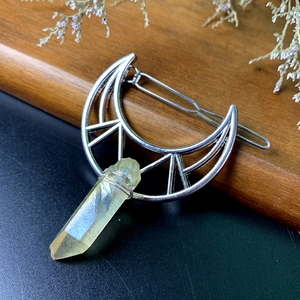 Silver crescent moon hair clip with natural raw yellow crystal and wire wrap design