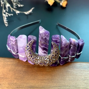 Handmade bohemian headband featuring raw purple crystals and a golden moon charm