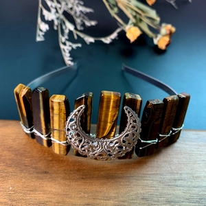 Detailed view of handmade headband with tiger eye stones and silver moon charm