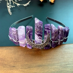 Detail of handmade bohemian purple amethyst crown with silver crescent moon moon on headband