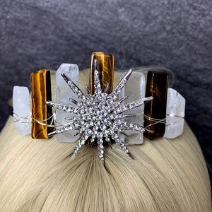 Detail of bohemian crown with star rhinestones and hand-wired natural crystals on a headband