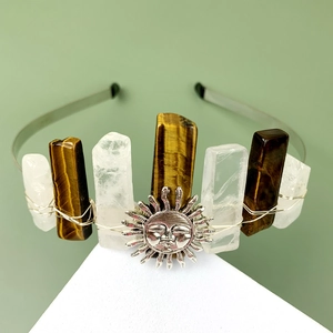 Detail of tiger eye and white crystal headband with sun charm and wire wrapping