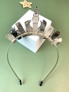 Detailed view of handmade crystal crown headband with raw stones and floral metal charms
