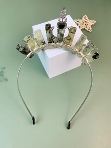 Detailed close-up of handmade green crystal quartz crown headband with silver wire wrap
