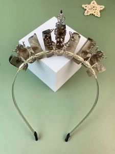 Detail of silver wire crown headband featuring raw smoky crystals and moon accents