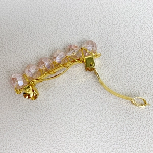 Fermaglio per capelli fatto a mano in filo dorato con sei perle di cristallo rosa