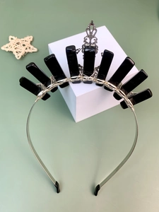 Detail of gothic crystal crown headpiece with black obsidian stones and silver wire wrapping