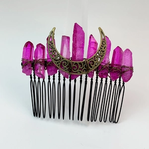 Detail of handmade crystal hair comb with purple clusters and bronze moon charm decoration
