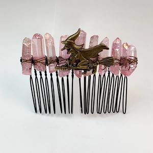 Detail of pink crystal hair comb with bronze witch charm and wire-wrapped branch design