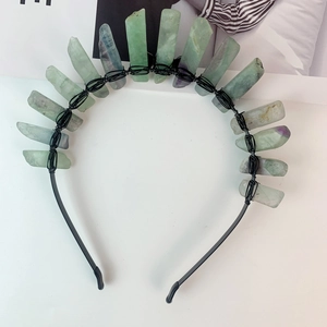 Close-up of handmade black metal crown headband with natural fluorite crystal stones