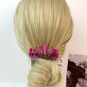 Natural rose crystal hair comb with golden crescent moon on elegant blonde hair