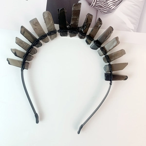 Detailed view of handmade black crystal crown with smoky quartz pillars and wire wrap