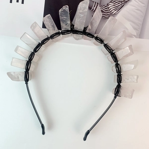Detailed view of handmade rose quartz crystal crown with black wire wrap craftsmanship