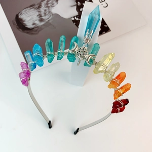 Detailed view of handmade rainbow crystal crown headband with silver moon and star accents