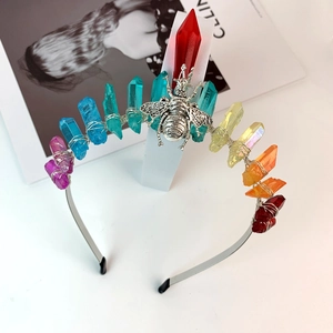 Detail of handmade rainbow crystal crown headband with silver bee centerpiece