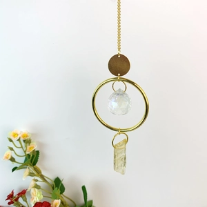 Natural crystal suncatcher wind chime with gold metal ring and faceted crystal ball