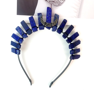 Detailed handmade crystal headband featuring raw blue stones and a silver moon ornament