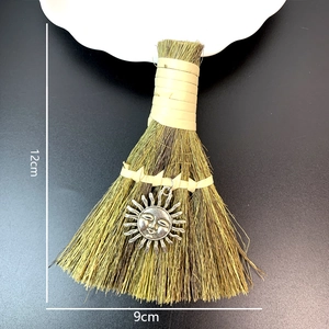Miniature handmade woven straw broom with silver sun pendant, 12cm tall decor tool