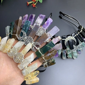 Handmade triple moon crown featuring raw natural crystal stones and silver metal details