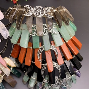 Handmade triple moon crown featuring natural crystal raw stones in various colors and styles