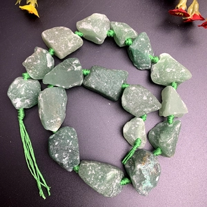 Natural green raw gemstone bead necklace with handmade woven cord and matching tassel