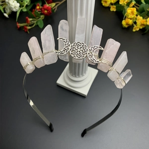 Detail of pink crystal crown headband with silver triple moon goddess symbol