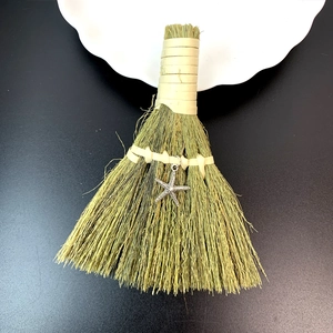 Handmade decorative grass broom with silver starfish charm for home holiday decoration