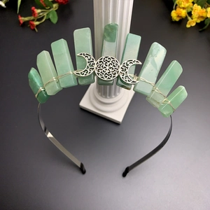 Detail showing natural green crystals and silver triple moon on a black headband