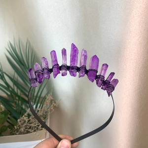 Detail of handmade black moon headband featuring raw purple quartz crystals and metal wire