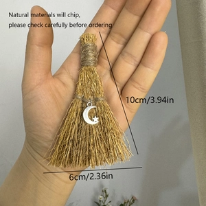 Handmade decorative grass broom pendant with silver moon charm and star detail