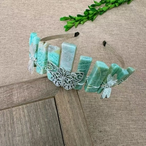 Detail of handmade crystal headband featuring green amazonite and dragonfly metal charms