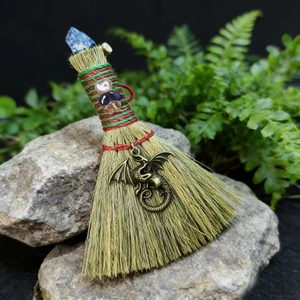 Miniature magic altar broom with natural fiber bristles and bronze dragon pendant