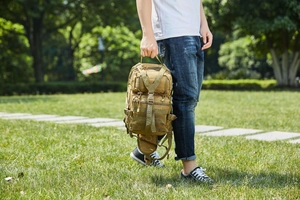 Outdoor khaki tactical backpack with MOLLE system for hiking and camping activities