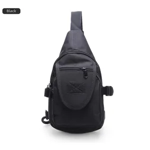 Close-up of black tactical chest bag with durable nylon material and velcro patch area