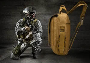 Detail of khaki tactical bag with MOLLE system and padded breathable shoulder strap