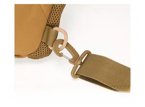 Detail of high-strength tactical buckle, D-ring and breathable mesh on outdoor chest bag
