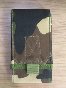 Detail of woodland camouflage tactical MOLLE phone pouch with durable nylon stitching