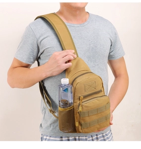 Detailed shot of khaki tactical chest bag showing side mesh pocket and nylon texture