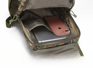 Internal laptop compartment of digital camouflage tactical backpack showing tablet storage