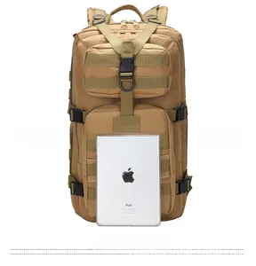 Tactical assault backpack in khaki with Molle system compared to an iPad for scale